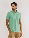 State of Art Poloshirt Piqué Melange Green Model / Voorkant