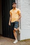 Suitable Fluo A Polo Shirt Bright Orange Model / Voorkant with Bram