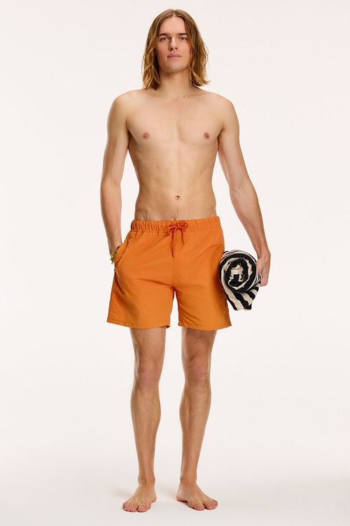 Shiwi Swimshorts Nick Desert Orange Model / Sfeerbeeld